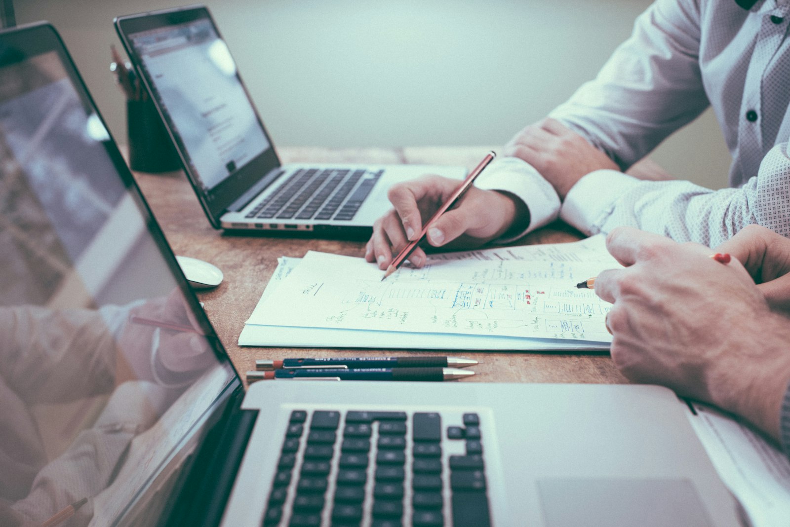 Professional reviewing documents at a desk, representing structured career planning work
